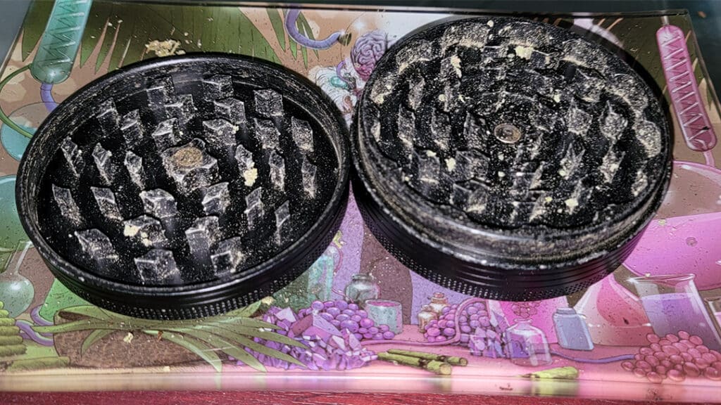 dirty metal cannabis grinder